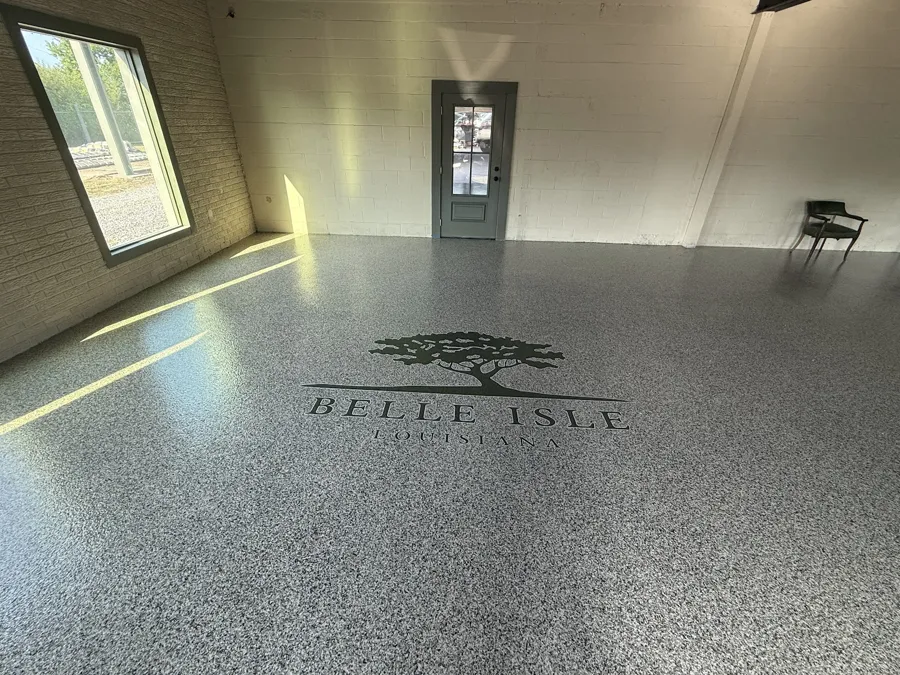 Commercial flake floor with a custom Belle Isle, Louisiana logo