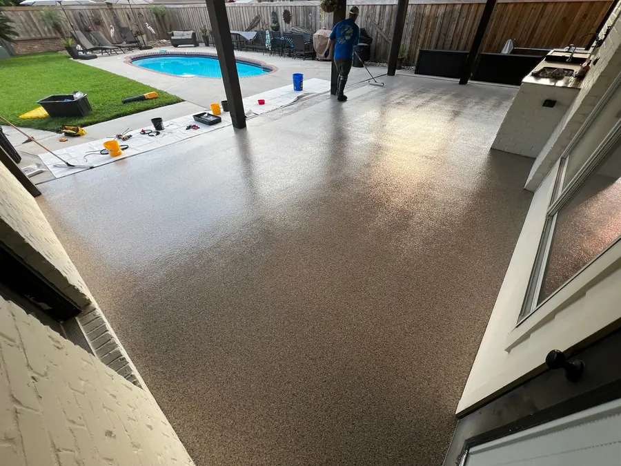 Covered pool patio finished in a flake coating