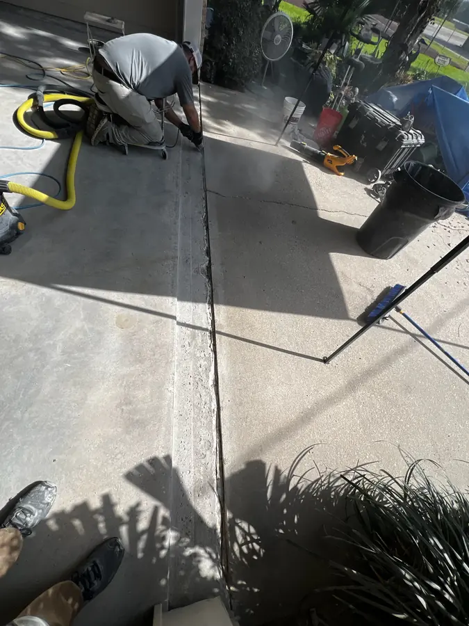 Grinding out a patio joint during surface prep