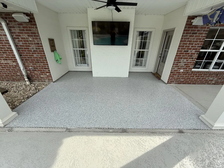Back patio coated in a speckled flake finish