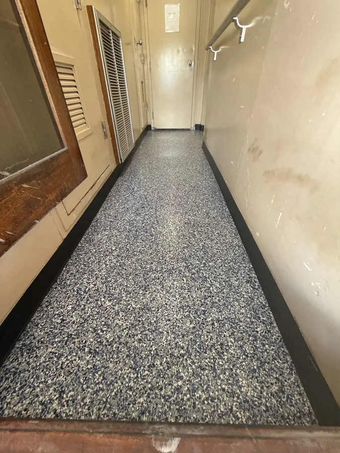 Long narrow vessel corridor finished in flake