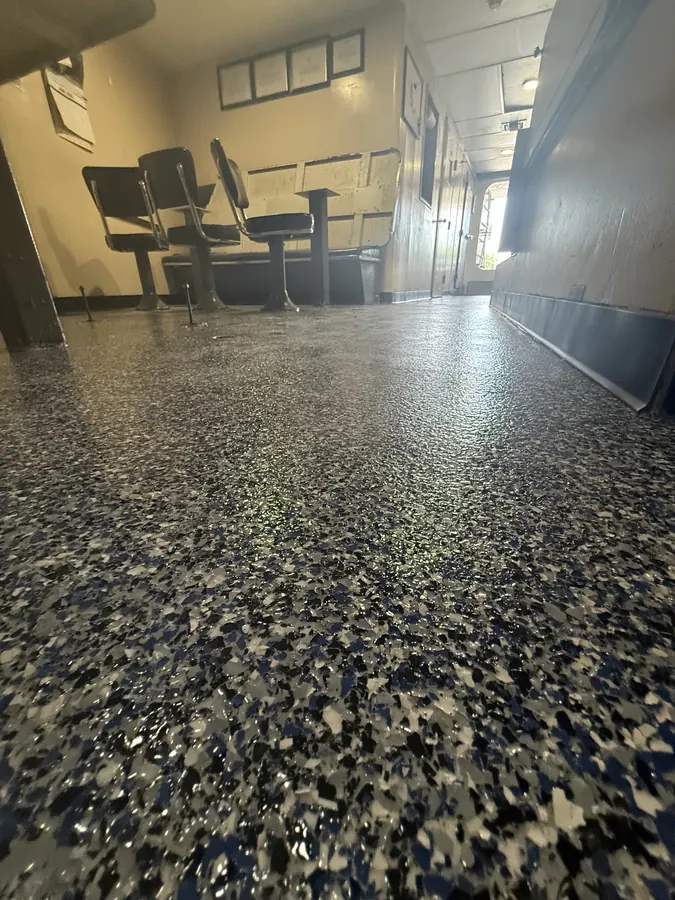 Mess deck seating over a fresh flake floor aboard a vessel