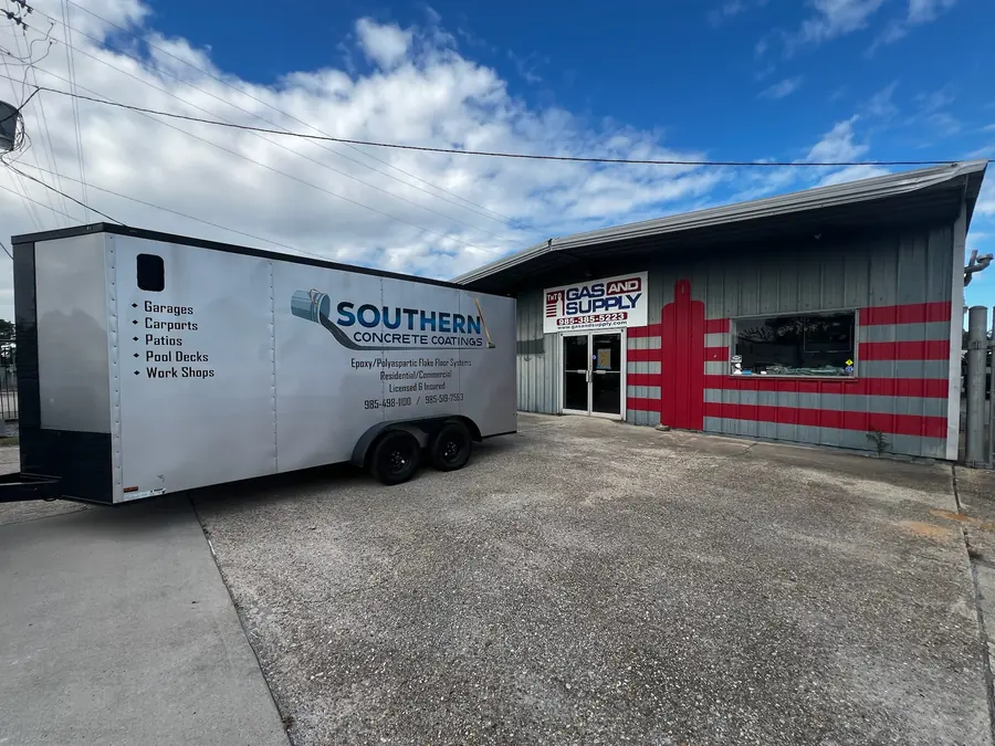 Southern Concrete Coatings trailer parked outside a commercial job