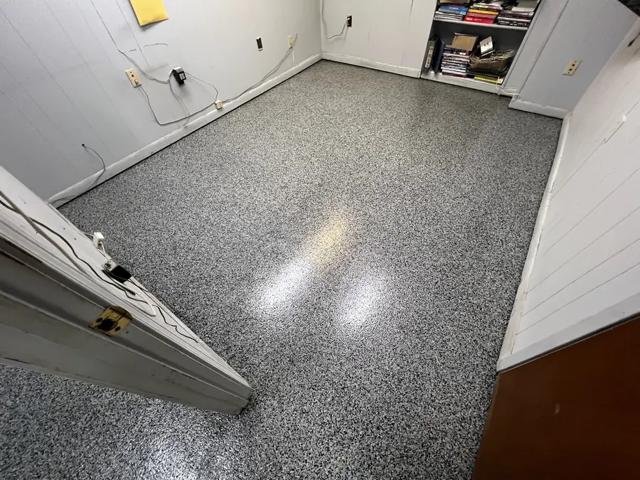 Grey flake floor in a back office storage room