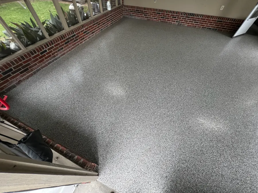 Brick-walled room finished in light grey flake