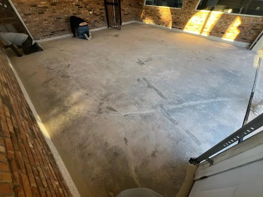Brick-walled sunroom slab before coating