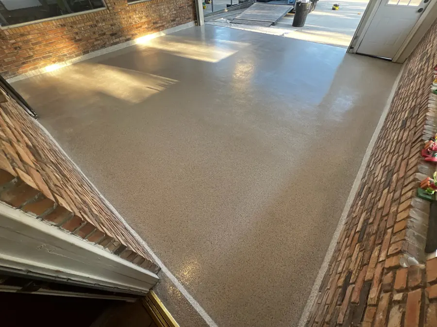 Brick-walled sunroom finished in tan flake